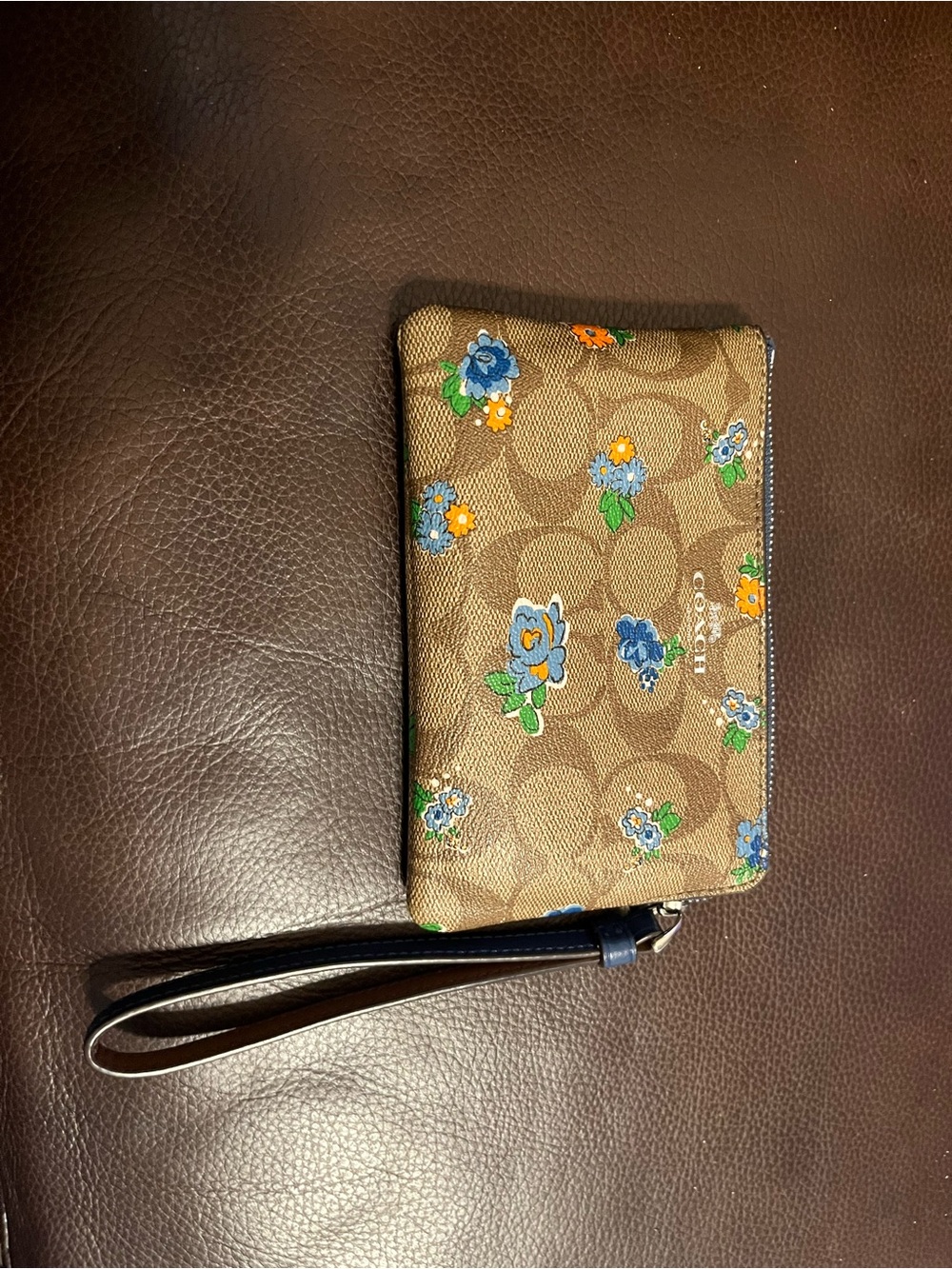 Coach Signature LOGO Leather Corner Zip Wristlet Khaki background floral print